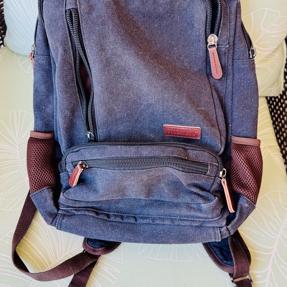Elegant Navy Backpack with Maroon Details
